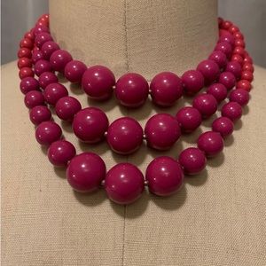 Pink 2 toned 3 layer bead necklace.